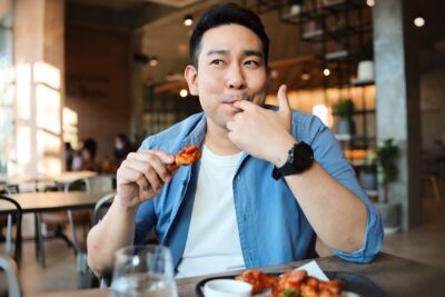 A man enjoying Sanibel Restaurants.