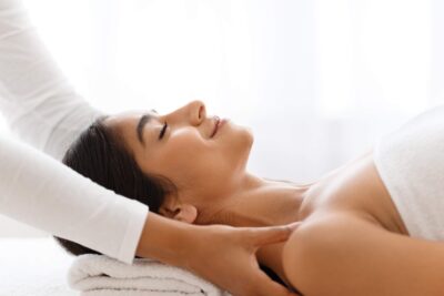 A woman enjoying Postpartum Wellness.