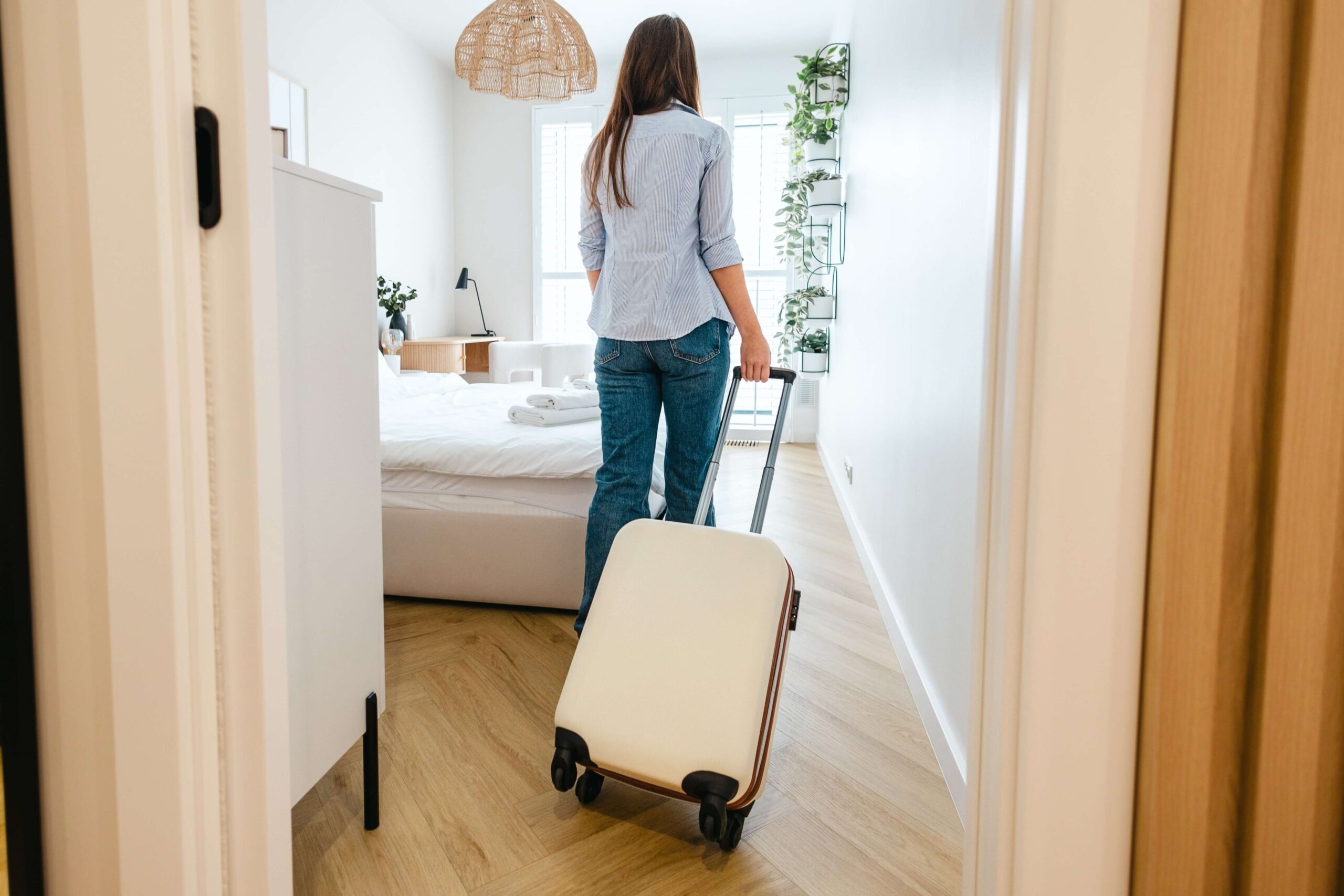A woman walking into a Sanibel Island Rental.